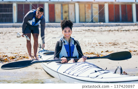 Sports, portrait or man and woman in kayak on sand at lake, beach or river for exercise on vacation. Ocean holiday, water adventure or fitness for happy couple in canoe training or workout with smile Sports, portrait or man and woman in kayak on sand at lake, beach or river for exercise on vacation. Ocean holiday, water adventure or fitness for happy couple in canoe training or workout with smile 137420897
