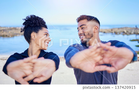 Beach workout, stretching hands and happy couple of friends smile for team exercise, sports or athlete fitness. Summer wellness, eye contact and nature people training, active and start warm up Beach workout, stretching hands and happy couple of friends smile for team exercise, sports or athlete fitness. Summer wellness, eye contact and nature people training, active and start warm up 137420915