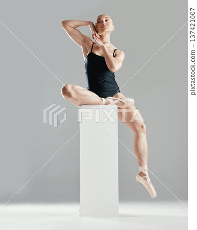 Balance, ballet or woman on block in studio in creative or elegant performance for art or freedom. Talent, dancer or girl ballerina dancing or training to exercise on platform or white background Balance, ballet or woman on block in studio in creative or elegant performance for art or freedom. Talent, dancer or girl ballerina dancing or training to exercise on platform or white background 137421007