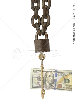 A conceptual image of financial power is depicted by a rusty chain with a padlock locking a number of hundred-dollar bills, ready to be unlocked, which are bound together with rough rope. 137421196