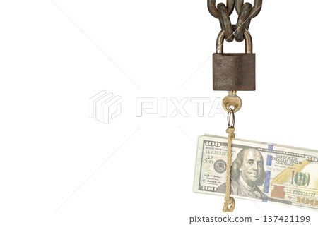 A conceptual image of financial power is depicted by a rusty chain with a padlock locking a number of hundred-dollar bills, ready to be unlocked, which are bound together with rough rope. A conceptual image of financial power is depicted by a rusty chain with a padlock locking a number of hundred-dollar bills, ready to be unlocked, which are bound together with rough rope. 137421199