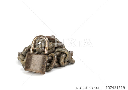 Rusty and Heavy Metallic Chain with an Old unlocked Padlock on White Background Conveys Security, Protection, and History 137421219