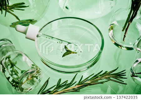 Natural skincare essence formulating in laboratory petri dish 137422035