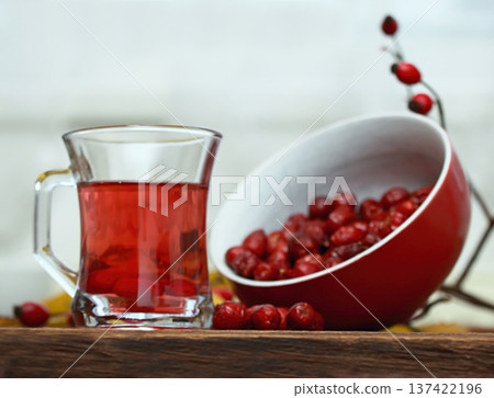 Rosehip tea tea full of vitamins and bowl with dried rosehips. Rosehip tea tea full of vitamins and bowl with dried rosehips. 137422196