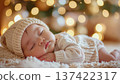 Portrait of a cute baby taking a nap 137422317