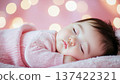 Portrait of a cute baby taking a nap 137422321