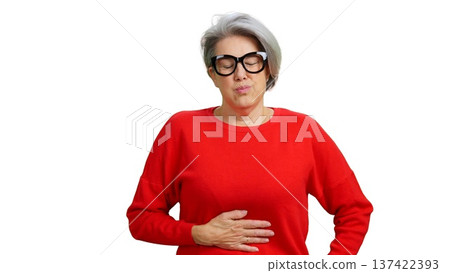 Senior woman suffering from stomach ache and indigestion 137422393
