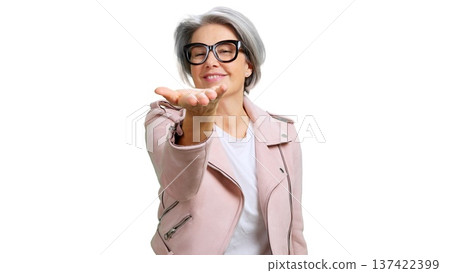 Mature woman showing empty open hand palm 137422399