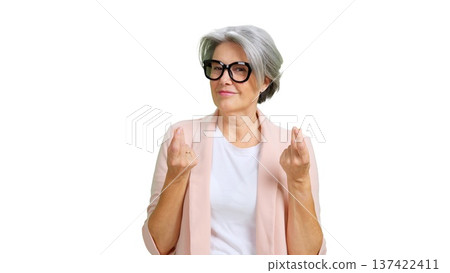 Mature woman showing money gesture for profit Mature woman showing money gesture for profit 137422411
