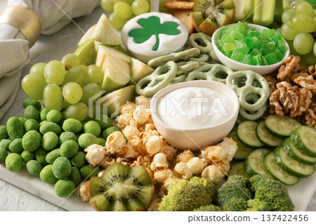 Healthy party snack board with dip and vegetables Healthy party snack board with dip and vegetables 137422456