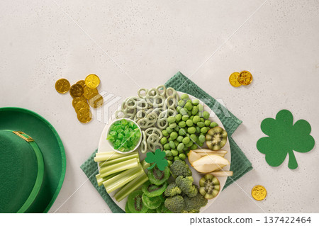 St Patrick Day green snack plate with festive decorations St Patrick Day green snack plate with festive decorations 137422464