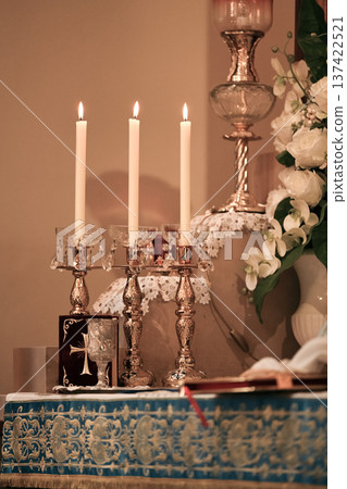 Armenian church altar with candles gospel book silver liturgical decor 137422521