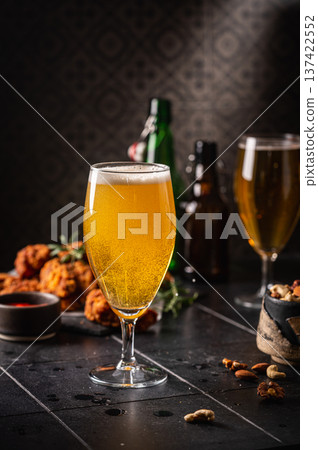 Glass of light beer 137422552