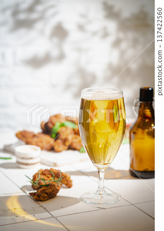 Glass of light beer 137422560