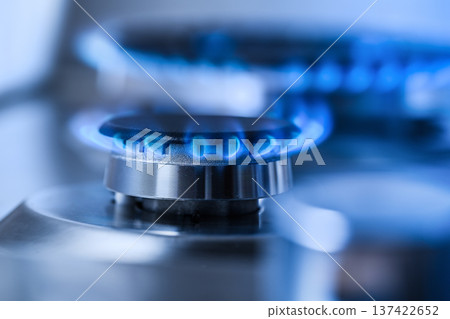 Kitchen gas cooker with burning fire propane gas Kitchen gas cooker with burning fire propane gas 137422652