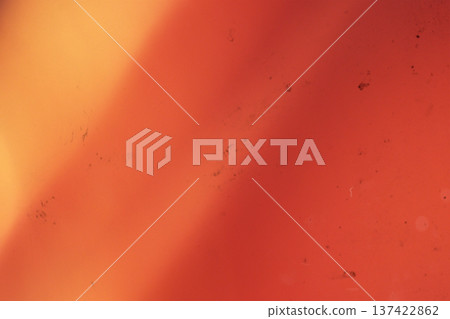Abstract distressed film burn texture with warm light leak, scratches, dust, and dark vintage gradient Abstract distressed film burn texture with warm light leak, scratches, dust, and dark vintage gradient 137422862