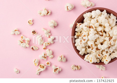 Tasty salty popcorn in a bowl Tasty salty popcorn in a bowl 137422925