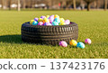 Tire Easter eggs grass spring pastel auto service holiday outdoors display in park, seasonal car care promotion concepts 137423176
