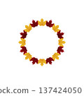 Circular wreath made of alternating red and yellow autumn leaves, creating vibrant and festive design. leaves are arranged symmetrically, forming perfect circle 137424050