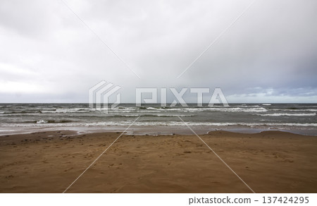 Gentle ripples on the sea surface. Natural flow and serene seascape atmosphere. 137424295