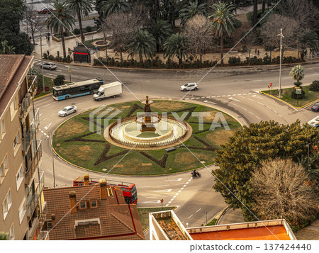 Aerial View Of City Roundabout With Ornamental Fountain And Palm Trees In Urban Landscape Aerial View Of City Roundabout With Ornamental Fountain And Palm Trees In Urban Landscape 137424440
