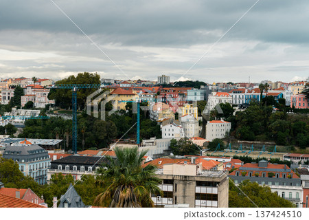 panoramic cityscape of lisbon with red rooftops and dramatic clouds panoramic cityscape of lisbon with red rooftops and dramatic clouds 137424510