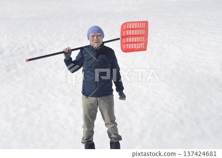 Snow removal for an elderly man living in a snowy country Snow removal for an elderly man living in a snowy country 137424681