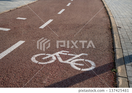 Image in the asphalt of a road with bike lane Image in the asphalt of a road with bike lane 137425481