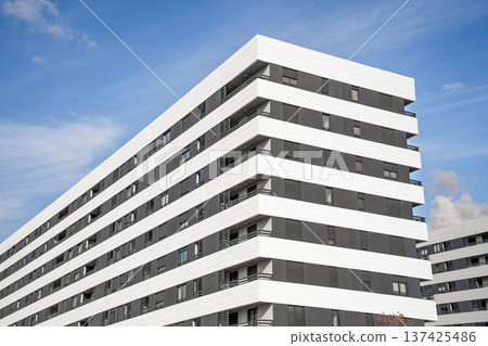Modern Residential Buildings with a beautiful blue sky background 137425486