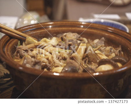 Heartwarming winter luxury: Steaming special sukiyaki Heartwarming winter luxury: Steaming special sukiyaki 137427173