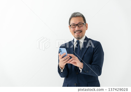 Business man smartphone Business man smartphone 137429028