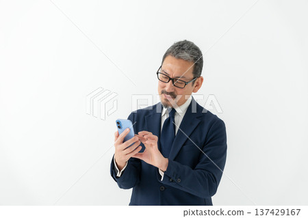 Business man smartphone Business man smartphone 137429167