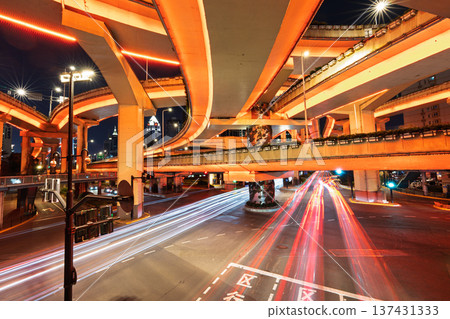Overpass at night and long-exposure light trails - China's urban transportation infrastructure concept Overpass at night and long-exposure light trails - China's urban transportation infrastructure concept 137431333