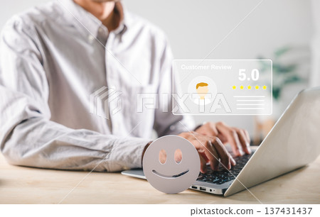Review customer feedback, positive online satisfaction concept for business service excellence. Person typing laptop, client evaluation shows 5 star quality rating, happy experience 137431437