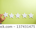 Hand places final five star review, illustrating customer feedback satisfaction for excellent service experience, online rating for quality business success and high survey rate 137431475