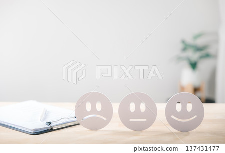Survey showing customer satisfaction review with various feedback emotions sad neutral happy faces and customer survey forms for overall customer experience 137431477