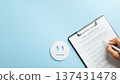 Customer survey form, gathering crucial customer satisfaction feedback, essential business data collection on paper checklist, contributing to service improvement review, depicting neutral face 137431478