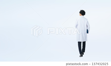 Full-body photo of a man in a white coat 137432025