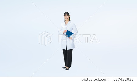 Full-body photo of a woman in a white coat holding a file 137432033