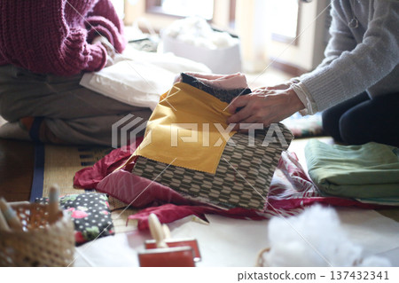 Woman choosing the fabric Woman choosing the fabric 137432341