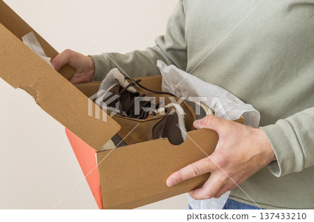 Opening Box With New Leather Boots Opening Box With New Leather Boots 137433210