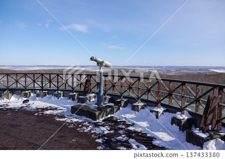 Telescope and blue sky at an observation deck overlooking the Kushiro Wetlands in winter, January 29, 2026, Kushiro City, Japan Telescope and blue sky at an observation deck overlooking the Kushiro Wetlands in winter, January 29, 2026, Kushiro City, Japan 137433380