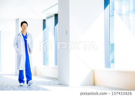 Young doctor working in a hospital 137433826