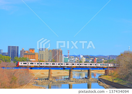 Okazaki City, Aichi Prefecture, scenery of the townscape of Okazaki City and Meitetsu train Okazaki City, Aichi Prefecture, scenery of the townscape of Okazaki City and Meitetsu train 137434094