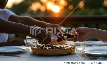 Hands Serving Berry Tart Slice at Sunset Dinner Hands Serving Berry Tart Slice at Sunset Dinner 137435076