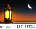 Ramadan Lantern with Crescent Moon in the sky. Islamic Holiday Greeting for Ramadan Kareem and Eid Mubarak. High quality photo Ramadan Lantern with Crescent Moon in the sky. Islamic Holiday Greeting for Ramadan Kareem and Eid Mubarak. High quality photo 137435531