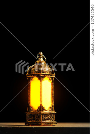 Vintage Ornate Lantern with Warm Glowing Light on Dark Background. Islamic Holiday Greeting for Ramadan Kareem and Eid Mubarak. High quality photo Vintage Ornate Lantern with Warm Glowing Light on Dark Background. Islamic Holiday Greeting for Ramadan Kareem and Eid Mubarak. High quality photo 137435546