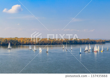 Yachts at sailing regatta on the Dnieper river in Kremenchug, Ukraine 137435668