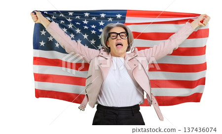 Senior woman celebrating American patriotism with United States flag 137436074