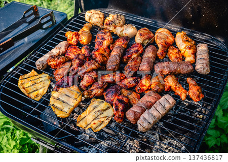 grilled meat over the coals on barbecue grilled meat over the coals on barbecue 137436817